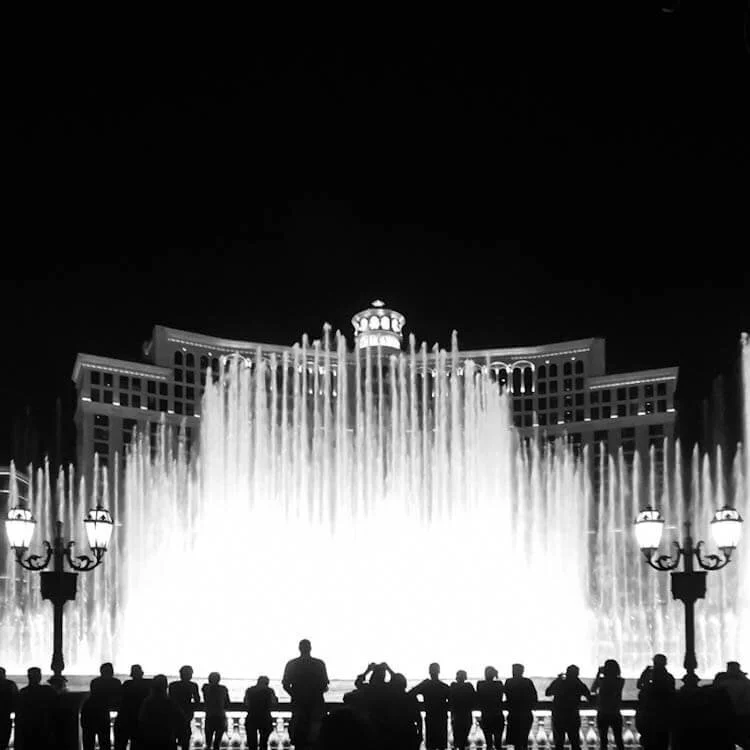 Silhouettes in front of the Fountains of Bellagio. Shot on iPhone 6 Plus