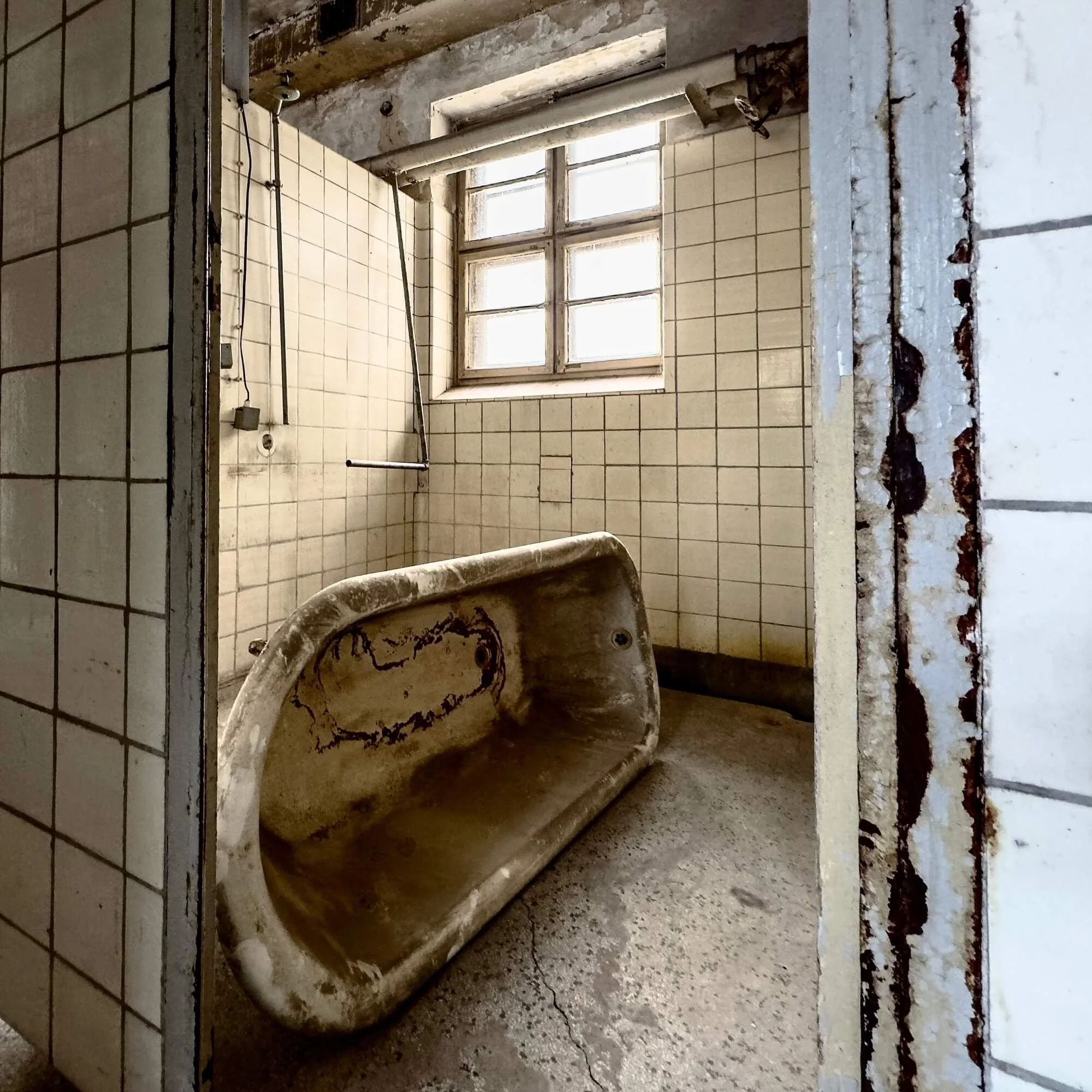 Bath cabins on an upper floor at the abandoned Stadtbad Lichtenberg