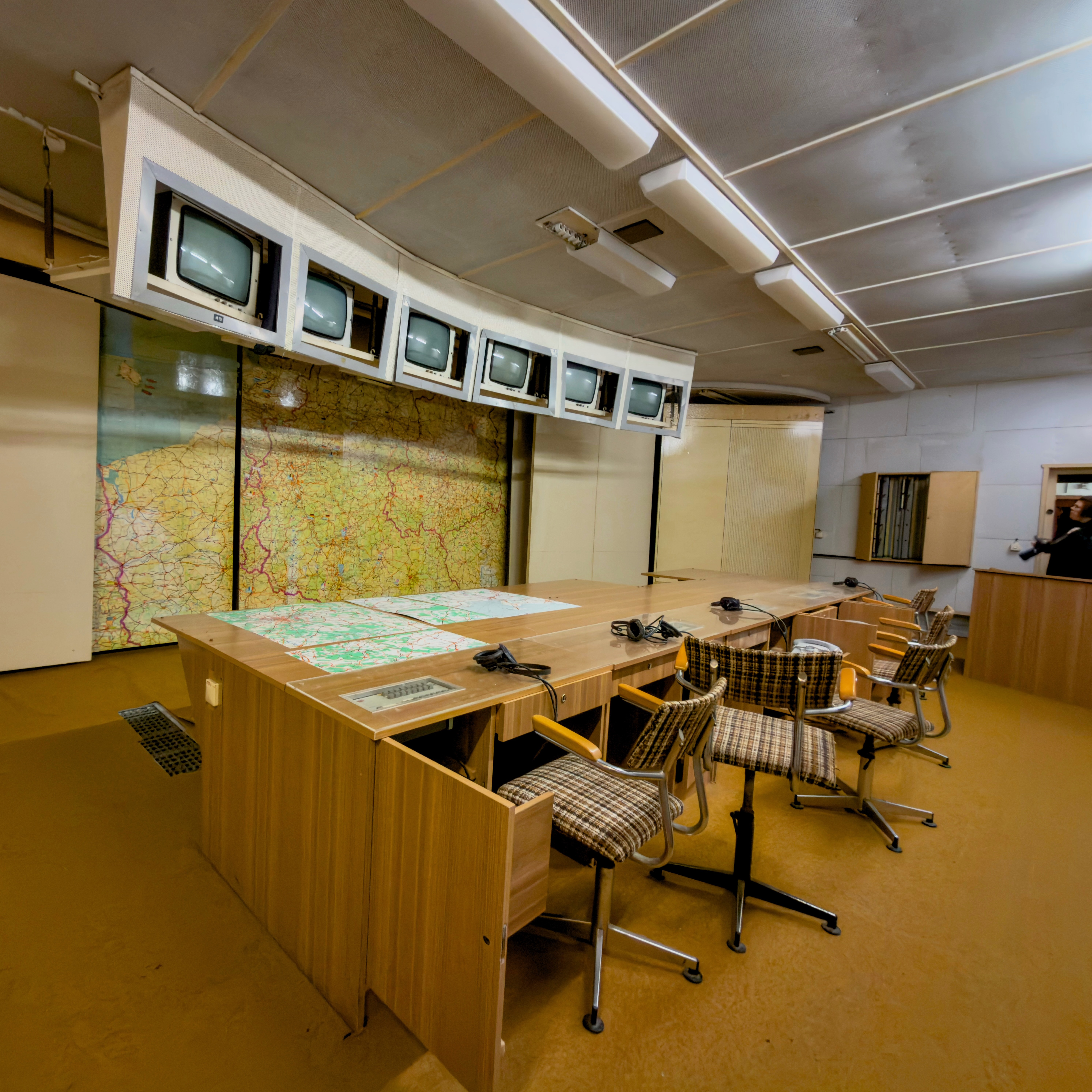 The preserved main control room photographed during an urbex tour at the abandoned Harnekop Bunker in Germany